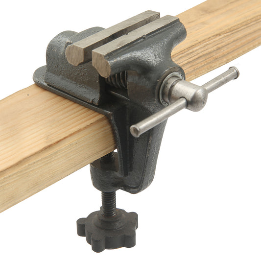Clamp on table vise. Jaws are 2" wide and Smooth